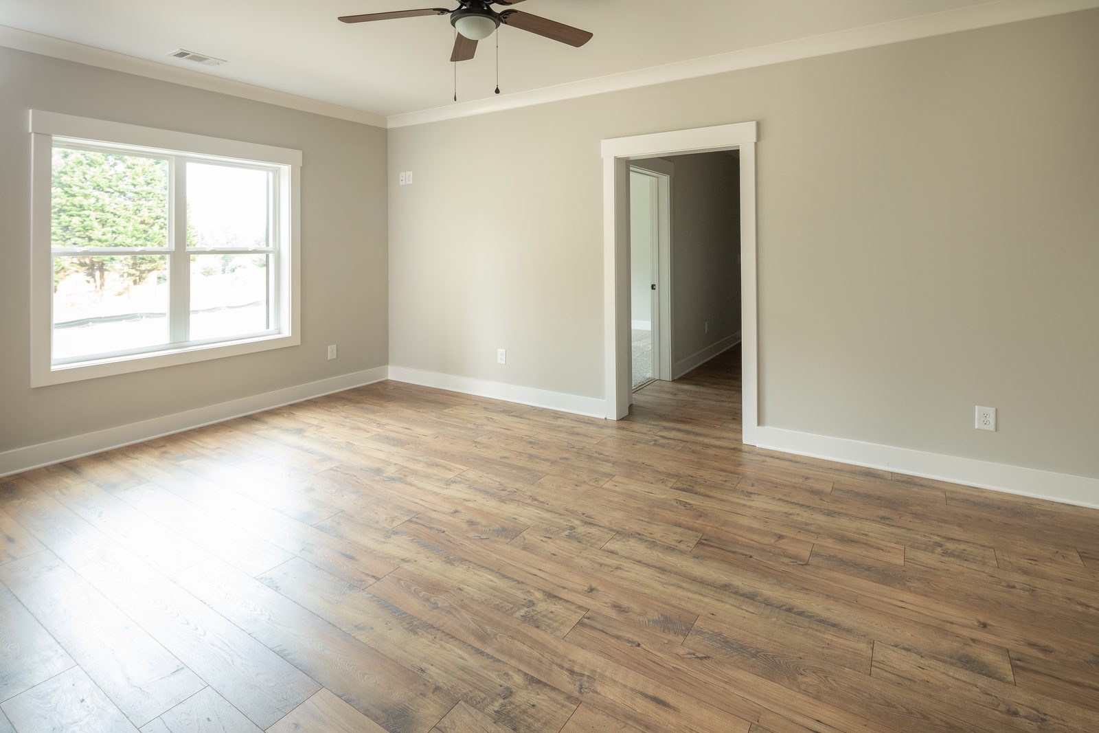 Flex room with hardwood floor and ceiling fan — Shadburn Ferry, custom home built by Ironwood Construction Group in Buford, Georgia